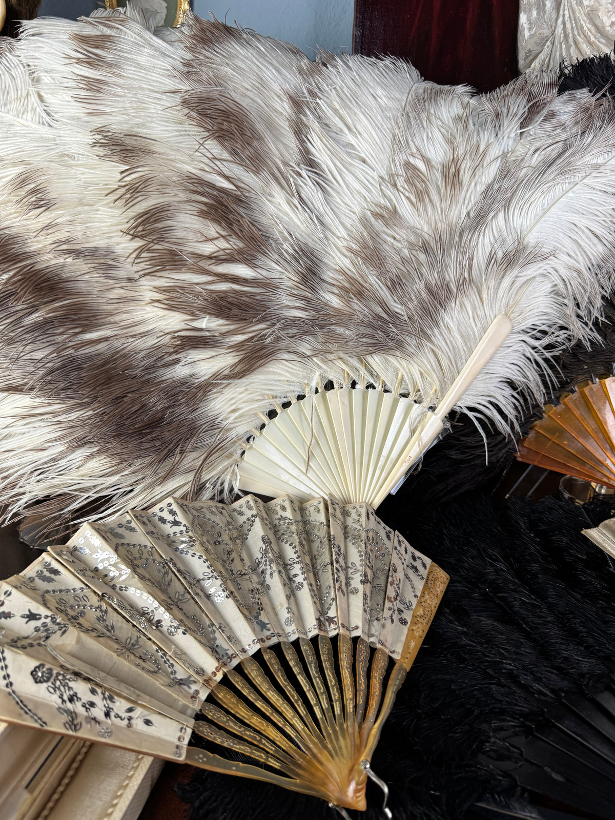 Set of Four Feather Fans and Three Antique Hand Fans – Late 19th to Early 20th Century