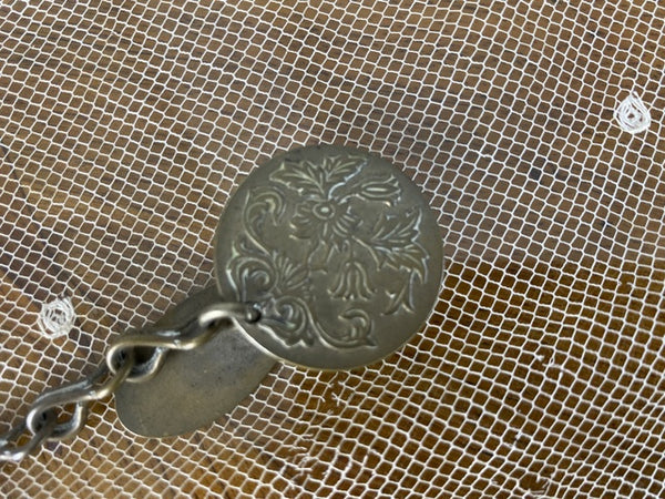Skirt Lifter, late 1870s