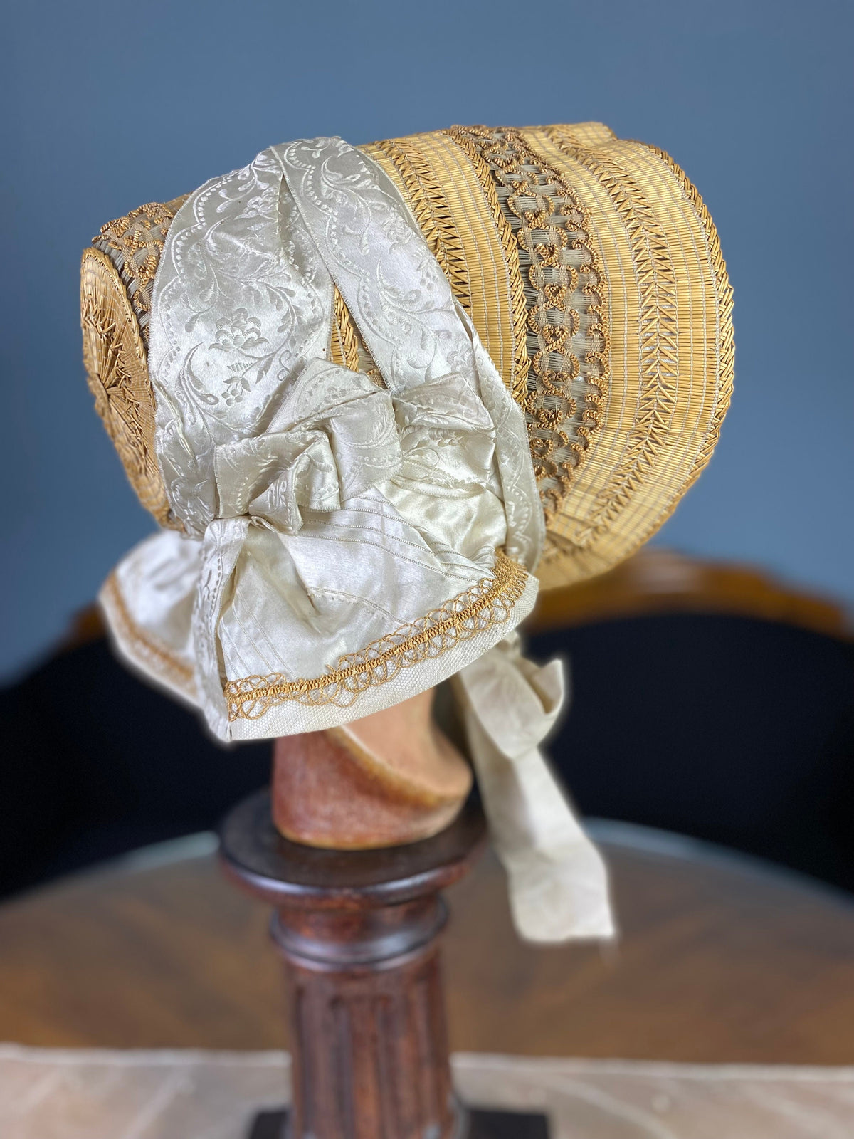 Antique crinoline-period garment from 1849 made of wire, straw, silk ribbons and damask lining in excellent condition