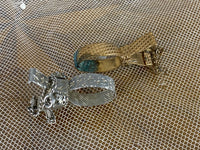 Two Skirt Clips, ca. 1890